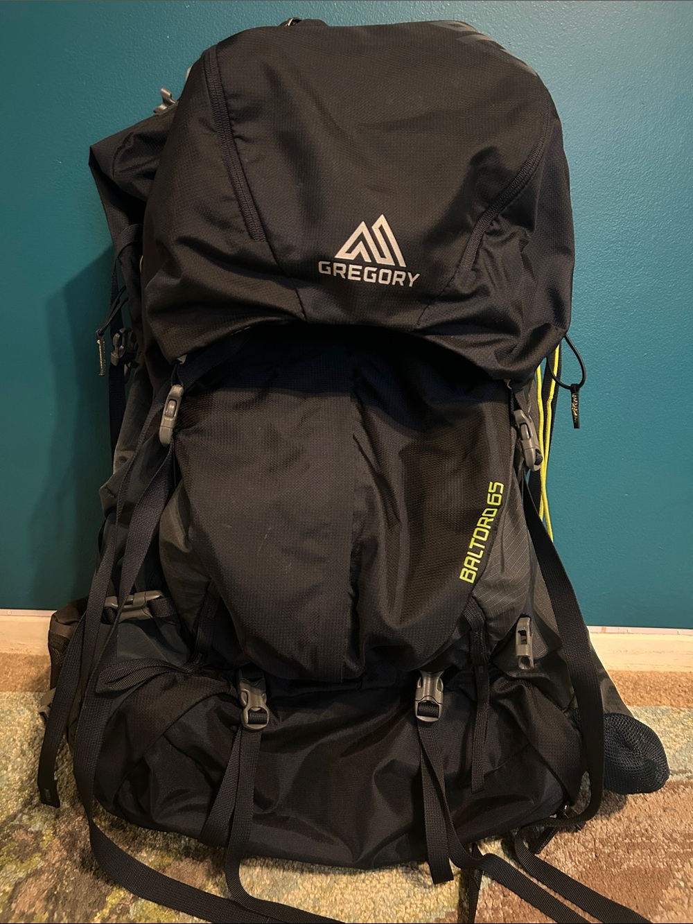 Gregory Black Baltoro 65 Hiking Backpack with Yellow Accents
